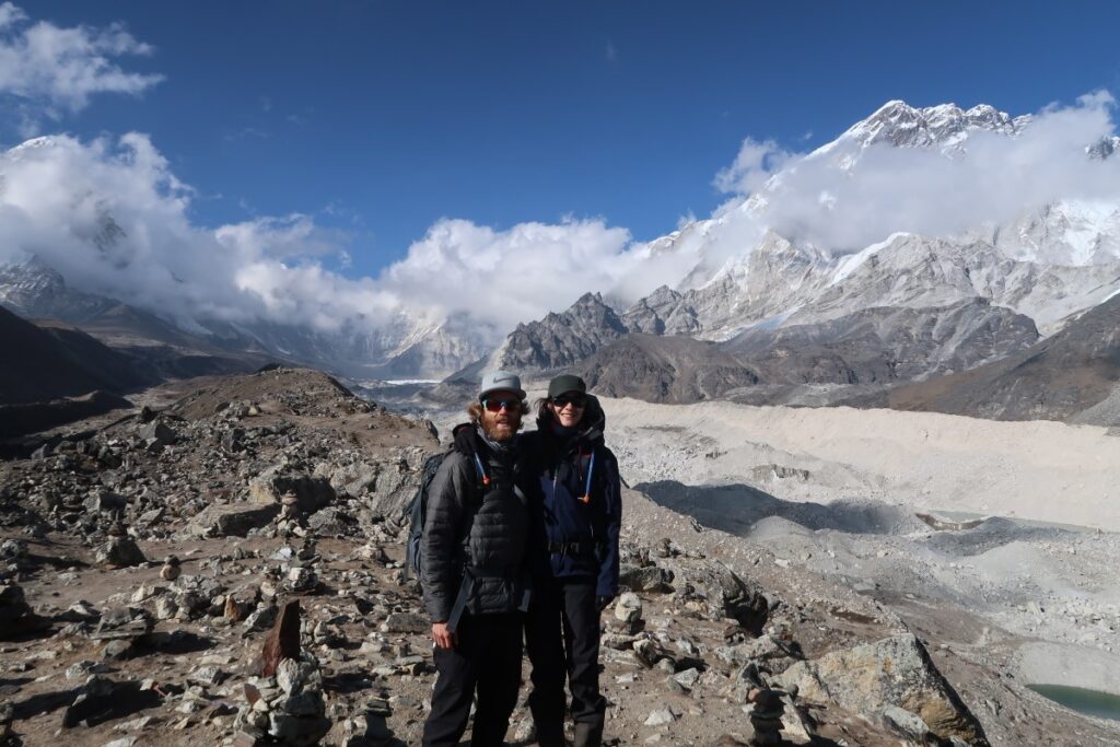 Couple in front of a moraine in Khumbu region Himalaya Nepal