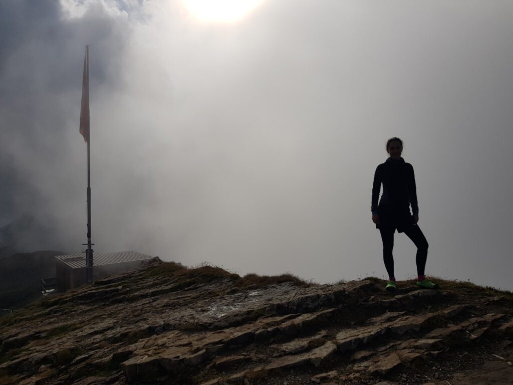 Women on top of Faulhorn Grindelwald in Switzerland trail running
